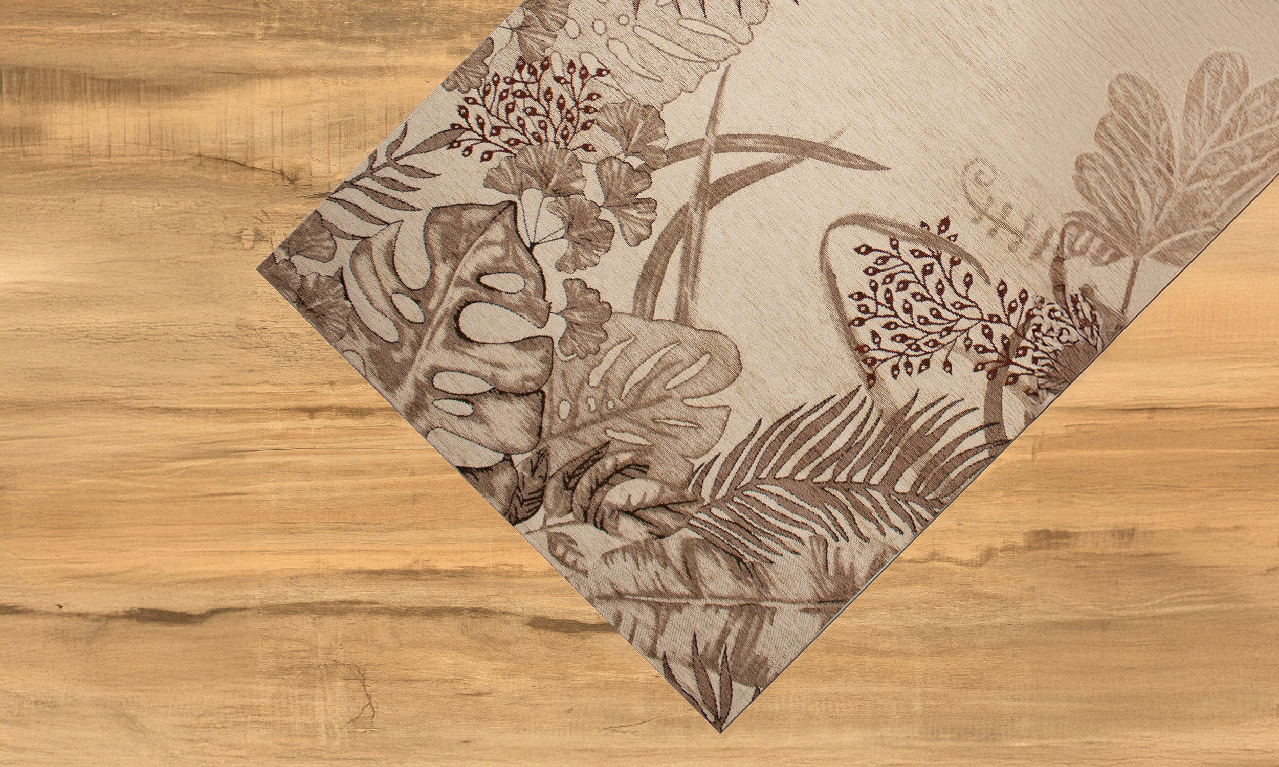 Tappeto arredato Dis.Amazonia in col. Camoscio, design floreale, dimensioni 65x115 cm, con antiscivolo.