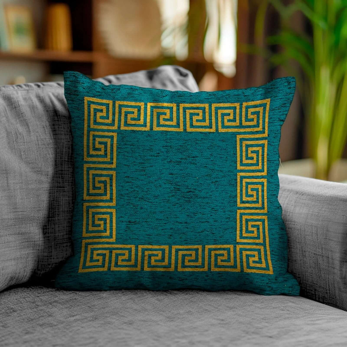 Coppia cuscini arredo jacquard sfoderabili Atene, cuscino decorativo in tessuto blu con motivo geometrico dorato.