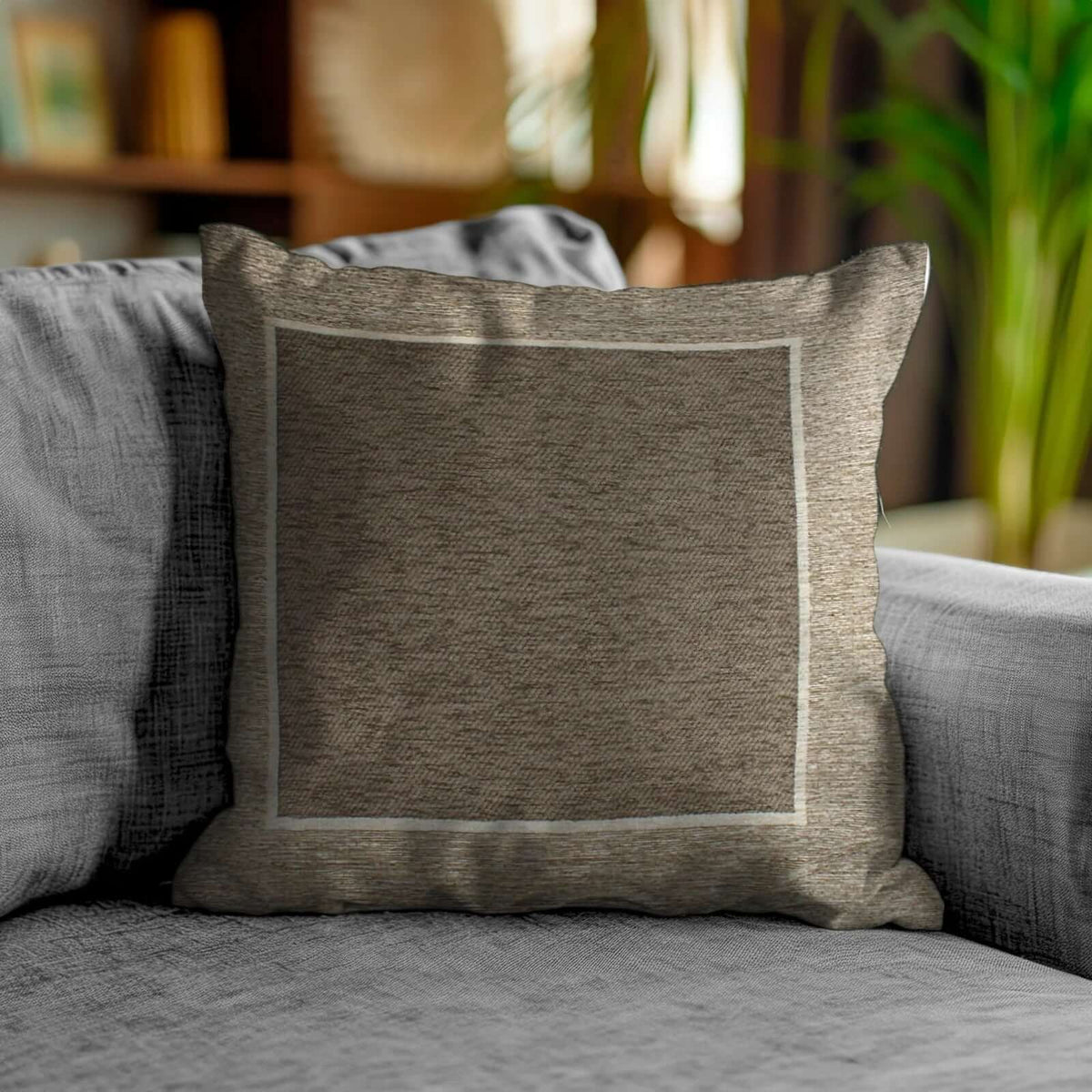 COPPIA CUSCINI ARREDO JACQUARD SFODERABILI ROMA su divano elegante, perfetti per decorare qualsiasi ambiente.