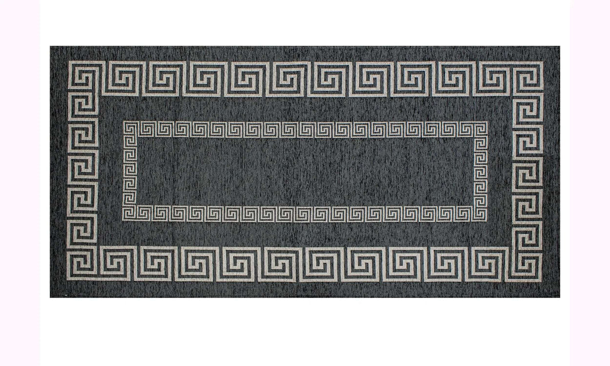 TAPPETO ARREDO ATENE NERO BIANCO CON ANTISCIVOLO, design elegante con motivi geometrici in bianco su sfondo nero.