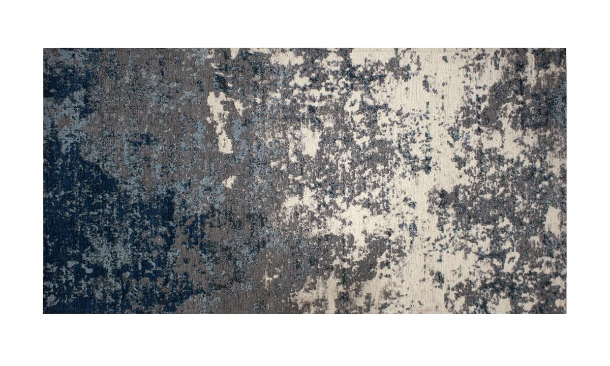 TAPPETO ARREDO DIS.BETA CON ANTISCIVOLO in tonalità blu e beige, ideale per arredamenti contemporanei.