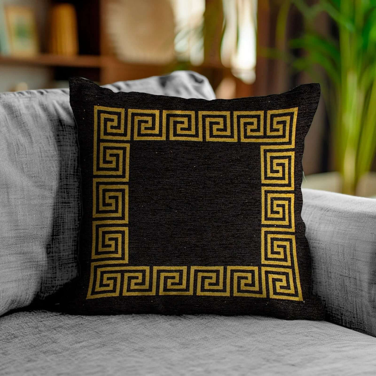 COPPIA CUSCINI ARREDO JACQUARD SFODERABILI ATENE decorativo con design geometrico in oro su sfondo nero.