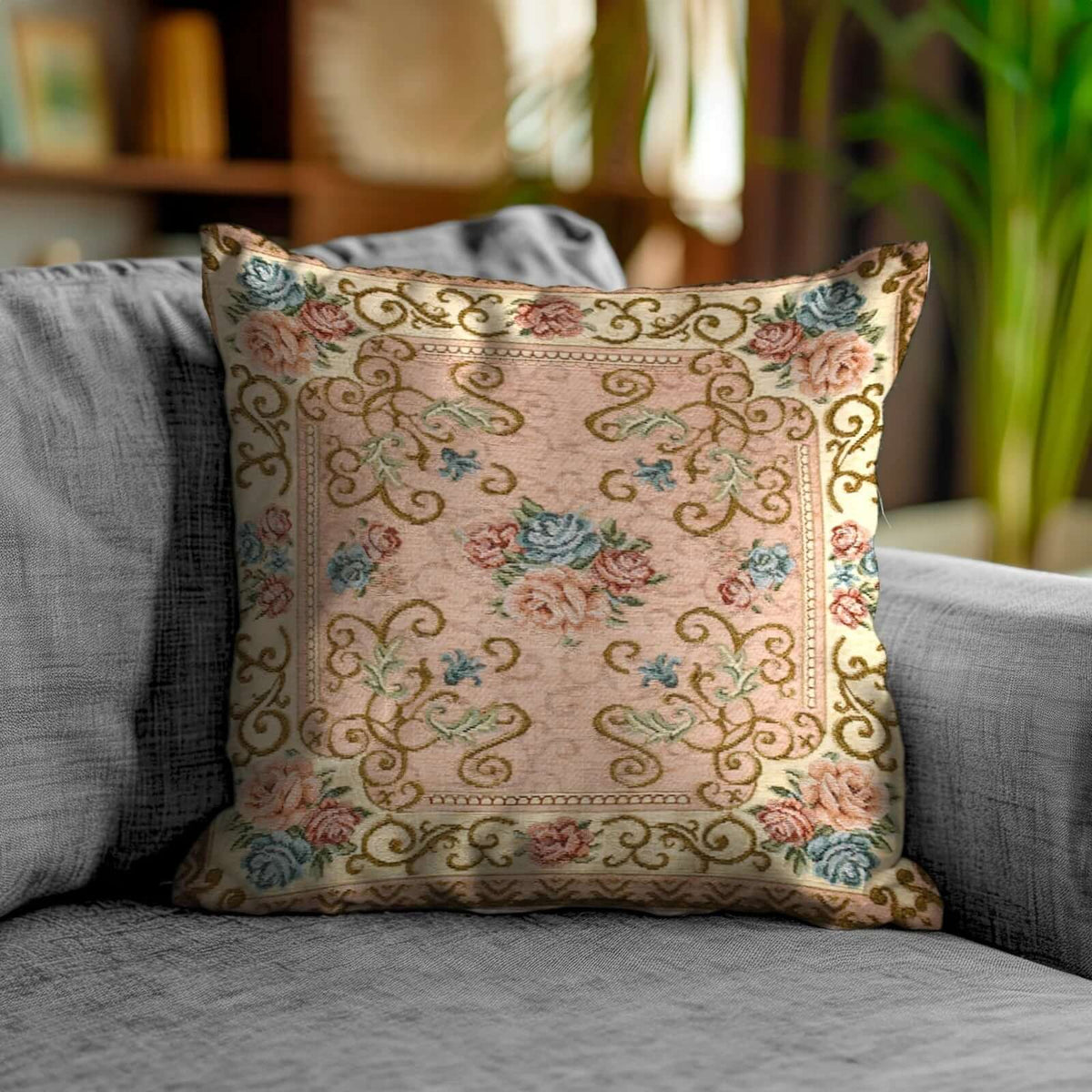 COPPIA CUSCINI ARREDO JACQUARD SFODERABILI VIENNA con design floreale su un divano elegante.