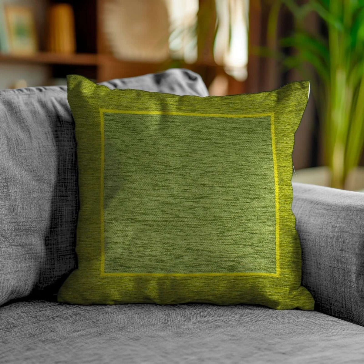 COPPIA CUSCINI ARREDO JACQUARD SFODERABILI ROMA su divano, cuscino verde con bordo giallo, decorazione moderna.