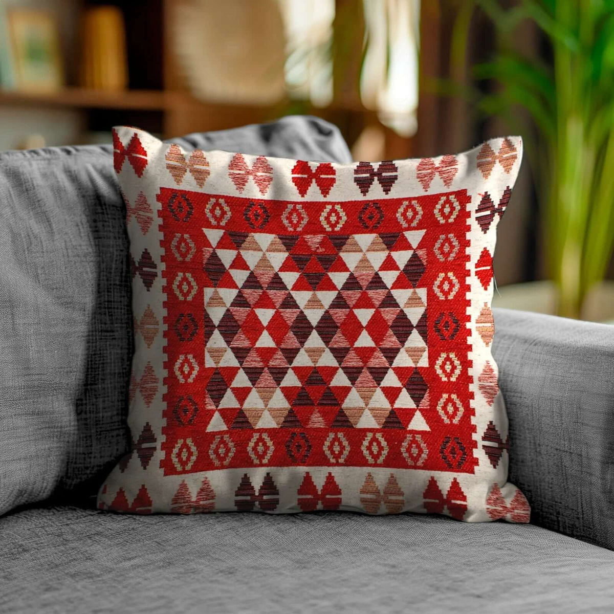 Coppia cuscini arredamento jacquard sfoderabili Kilim con motivi geometrici su divano