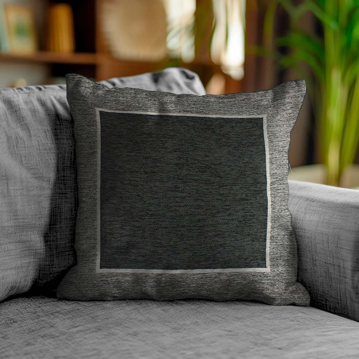 COPPIA CUSCINI ARREDO JACQUARD SFODERABILI ROMA cuscino decorativo in tessuto grigio su divano moderno.