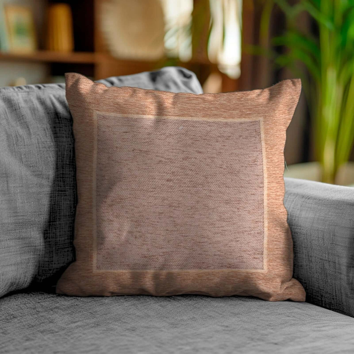 COPPIA CUSCINI ARREDO JACQUARD SFODERABILI ROMA su un divano grigio elegante, stile moderno.