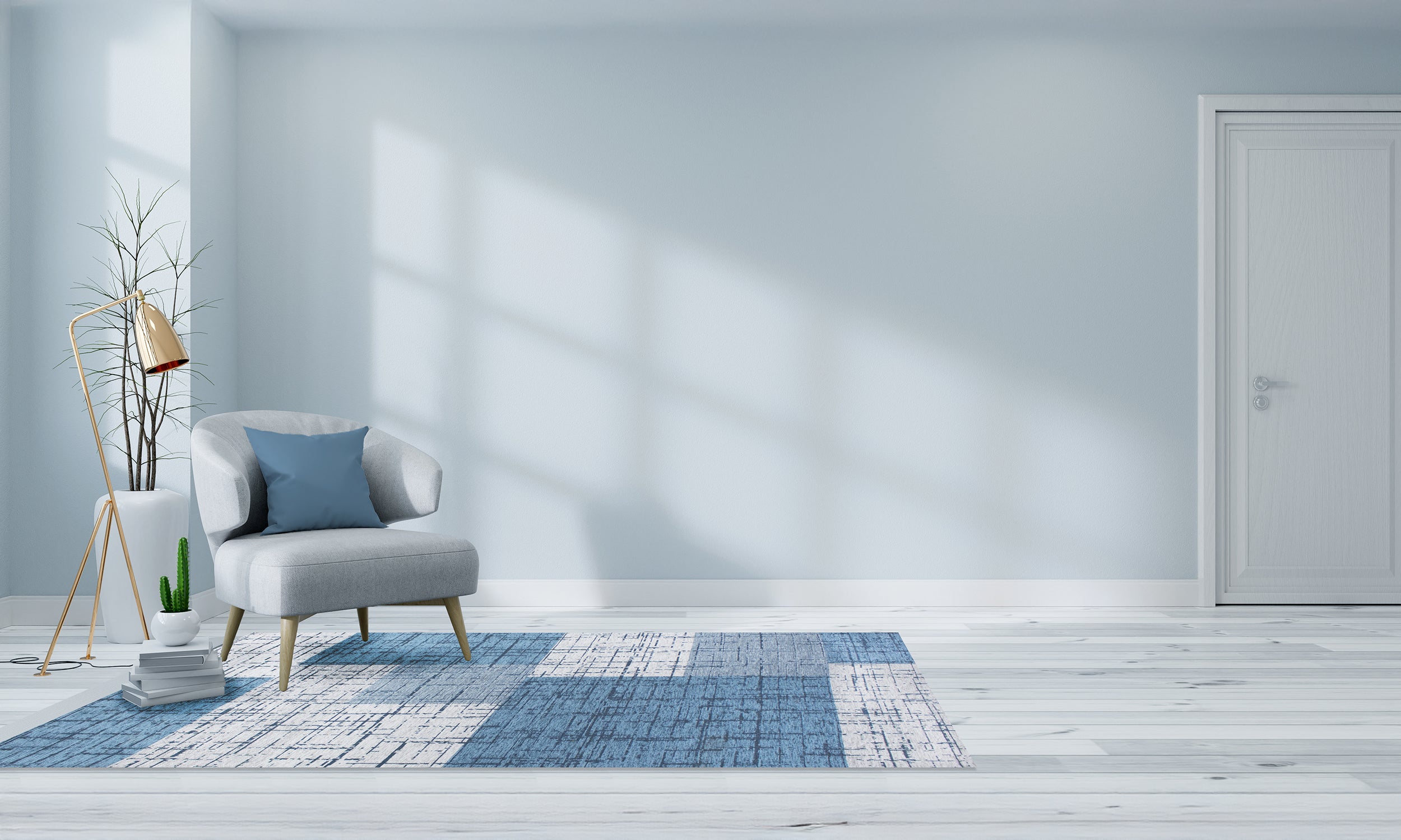Modern geometric rug in blue tones displayed in a cozy room with a chair and plant, enhancing decor.
