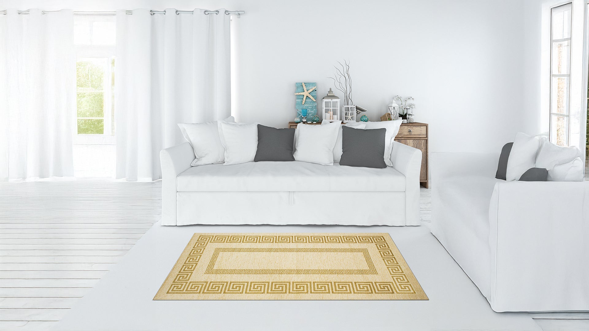 Elegant living room featuring a white couch and a stylish golden patterned rug on a light wooden floor.