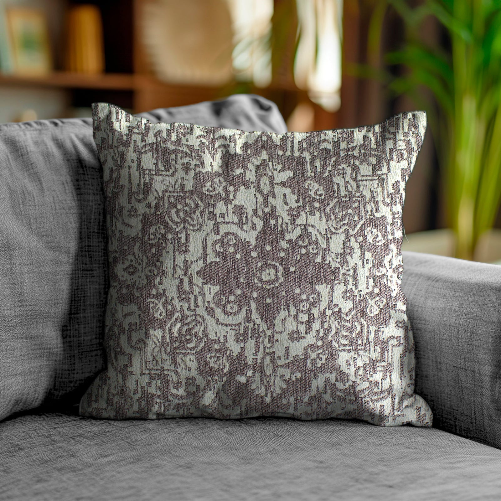 Decorative jacquard cushion on a gray sofa, 50x50 cm, perfect for modern or classic interiors.