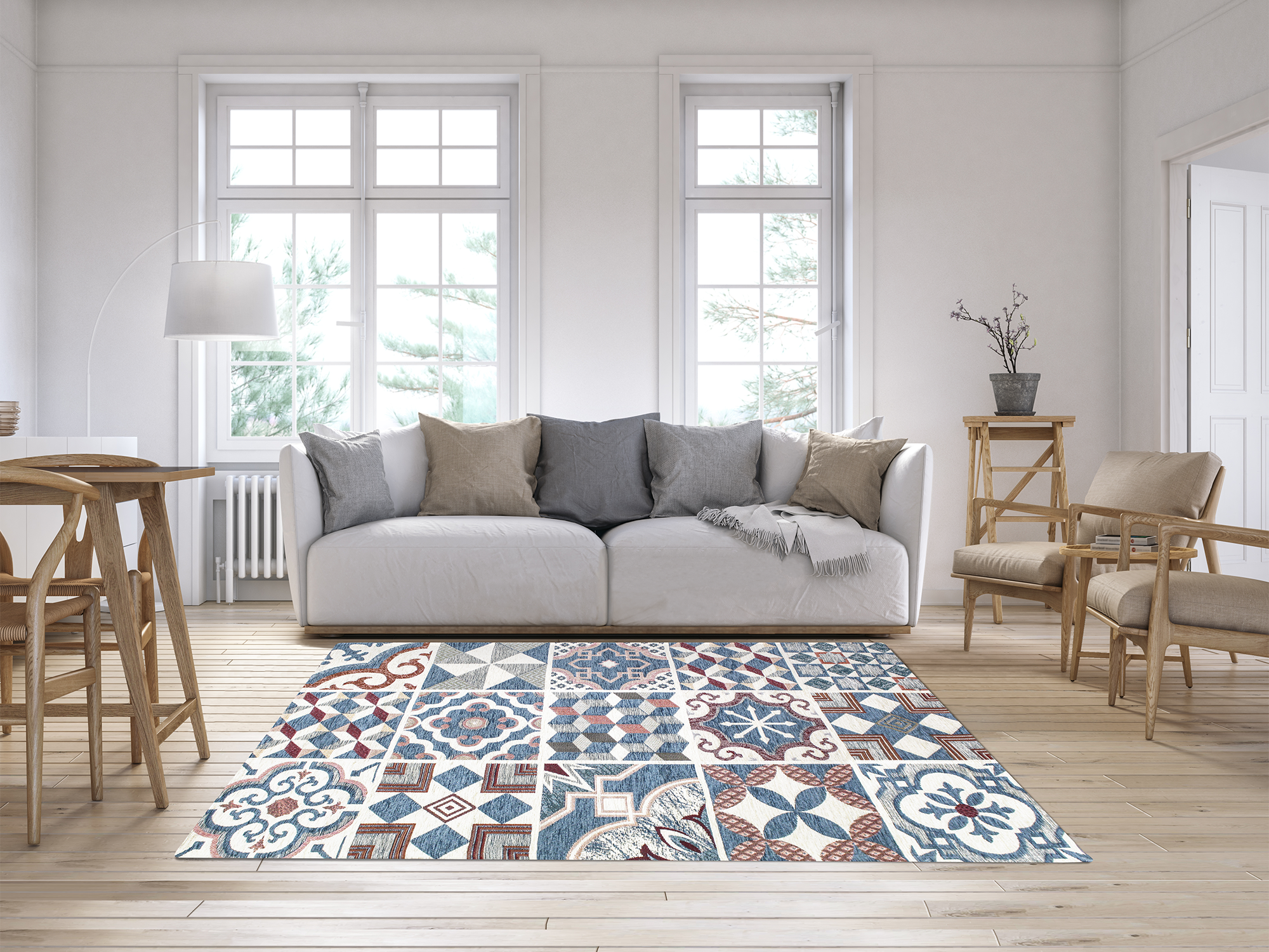 Modern blue and patterned area rug in a bright living room with a sofa and wooden furniture.