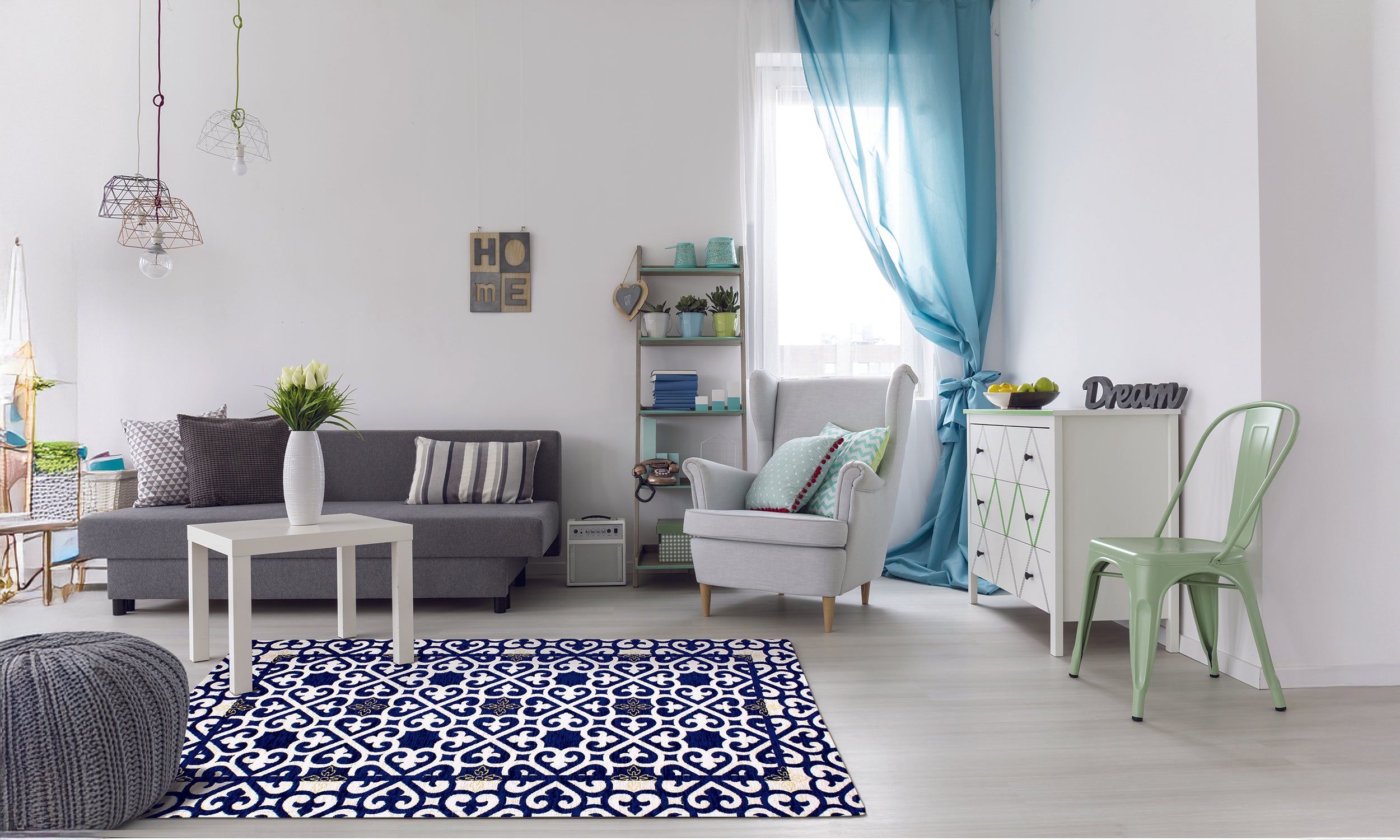 Modern blue patterned area rug in a stylish living room with a cozy seating arrangement.