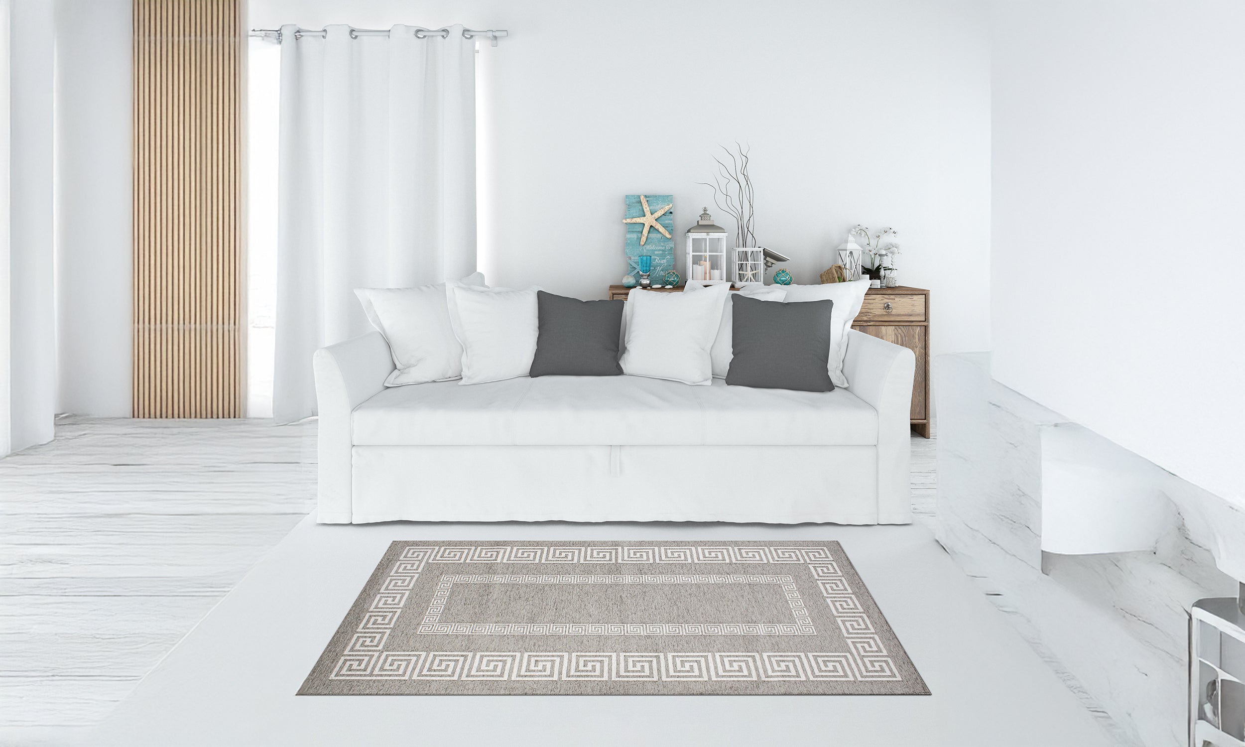 Modern grey anti-slip rug in a bright living room setting with white sofa and decorative elements.