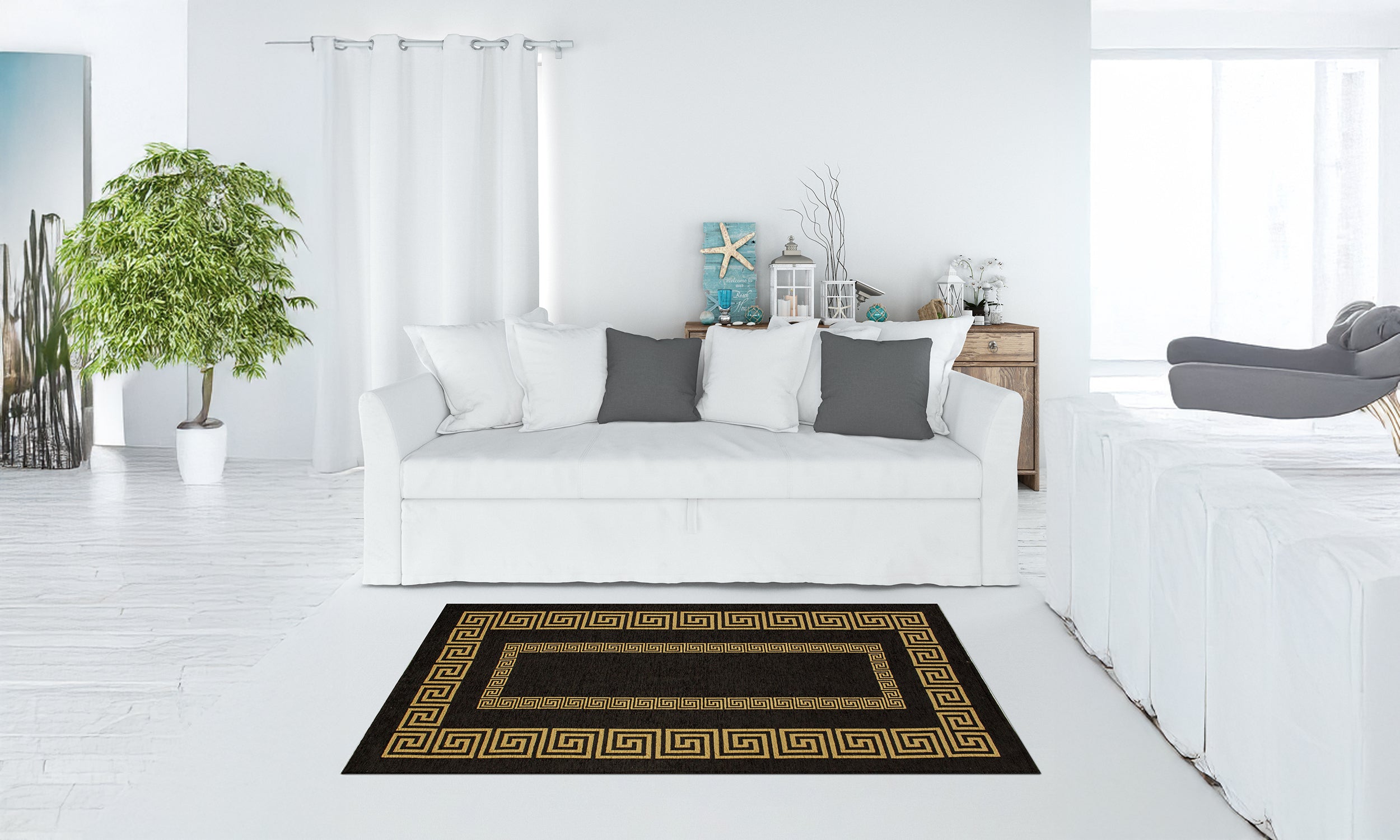 Modern black and gold area rug in stylish living room setting with white sofa and decorative plants.