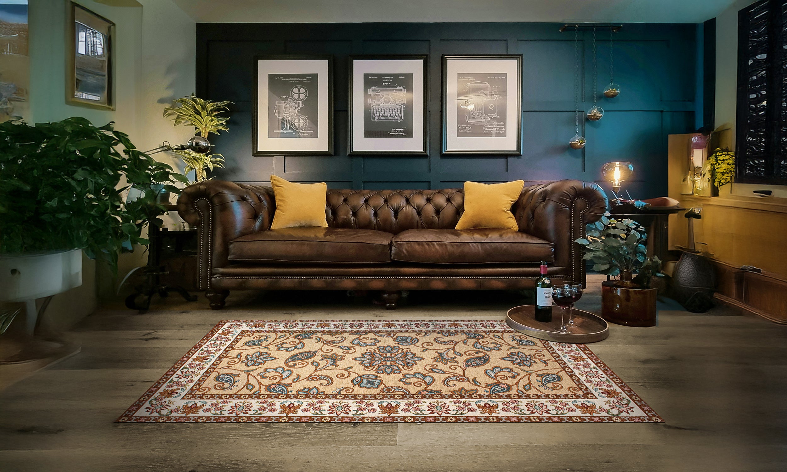 Elegant living room featuring a modern Sahara rug in soft hues, complemented by a classic leather sofa and cozy decor.