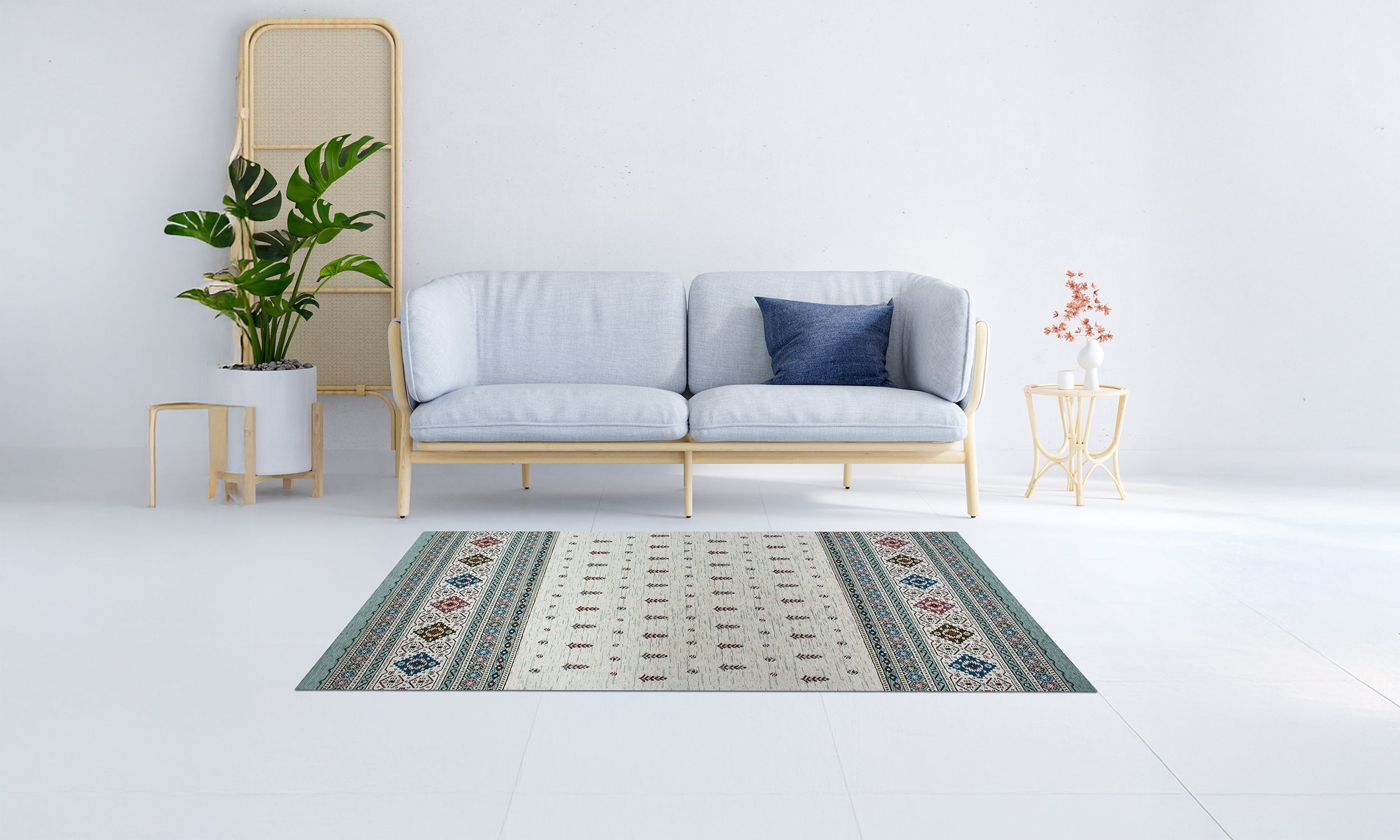 Modern green and beige rug on white tiled floor in stylish living room with blue couch and plants.