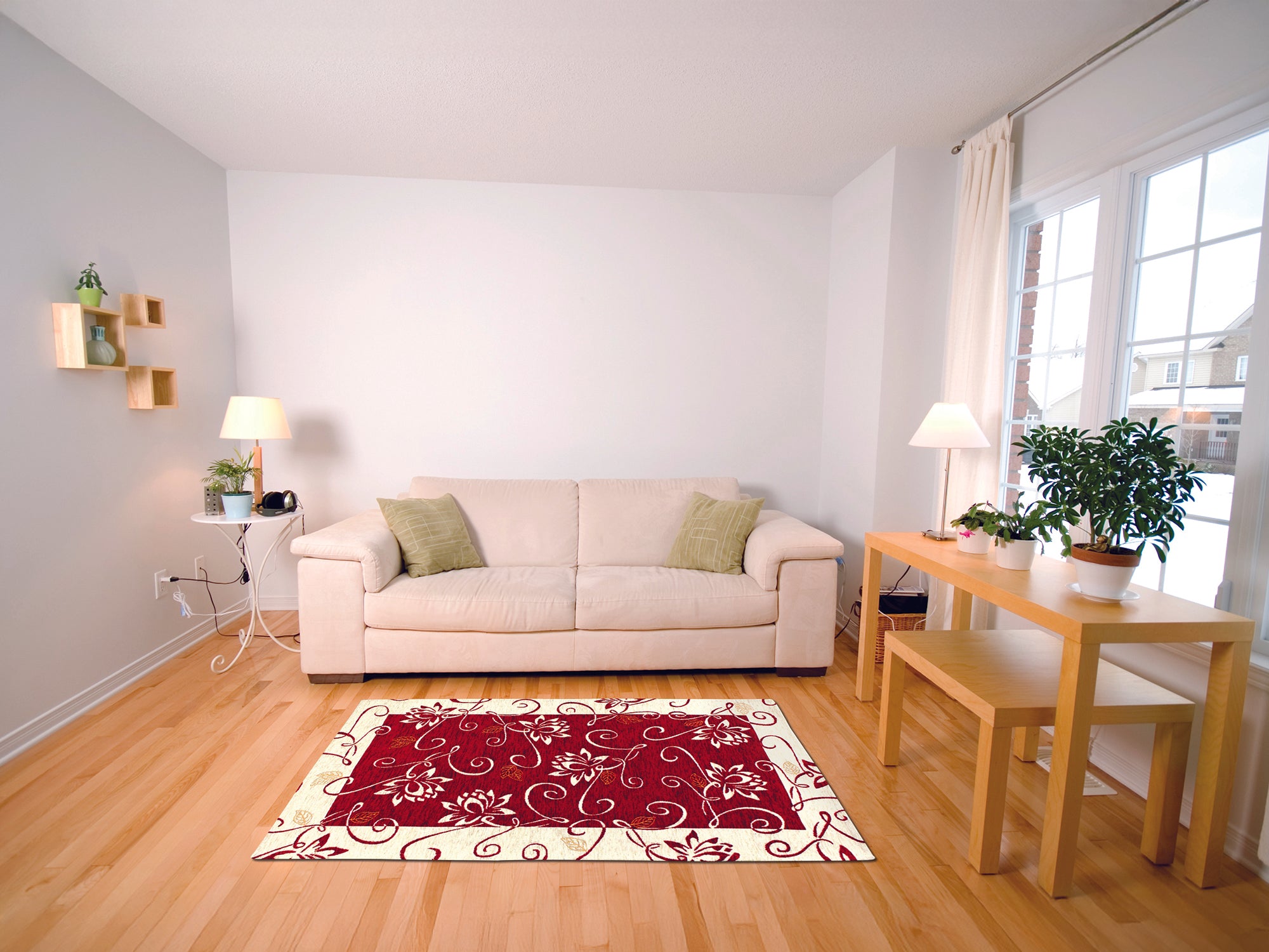 Living room featuring a modern red and cream decorative rug on wooden flooring.