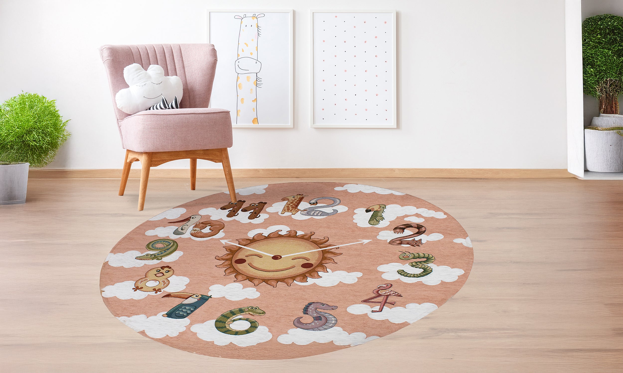 Round children's carpet featuring a sun and colorful numbers on a soft pink background.