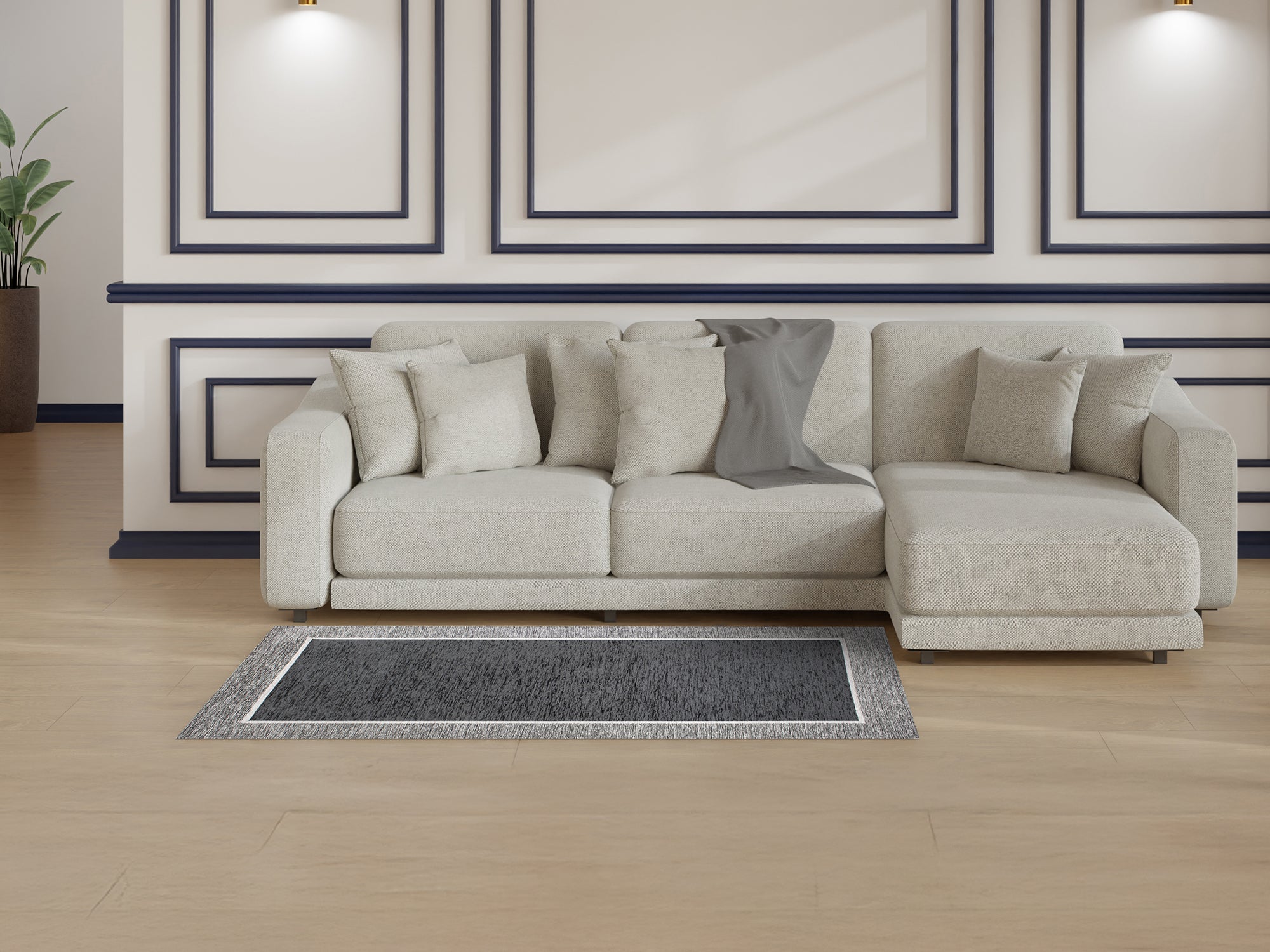 Tappeto moderno antracite 115x175 cm in soggiorno con divano grigio e dettagli eleganti.