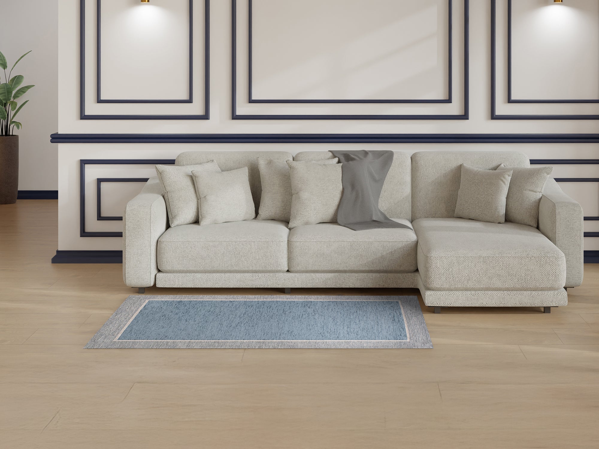 Modern light blue rug next to a cozy beige sectional sofa in a stylish interior.