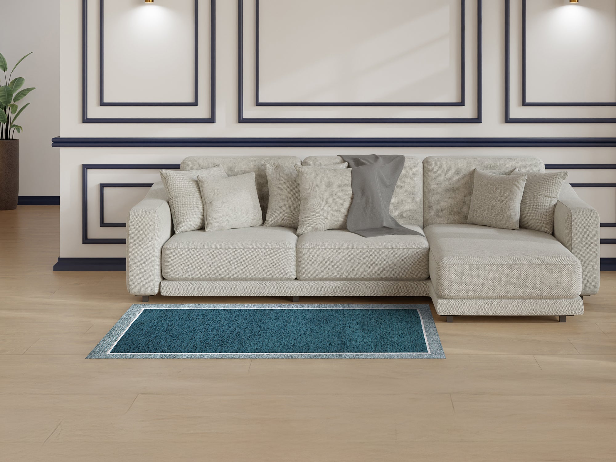 Modern petrol blue rug in cozy living room with light-colored sofa and decorative pillows.