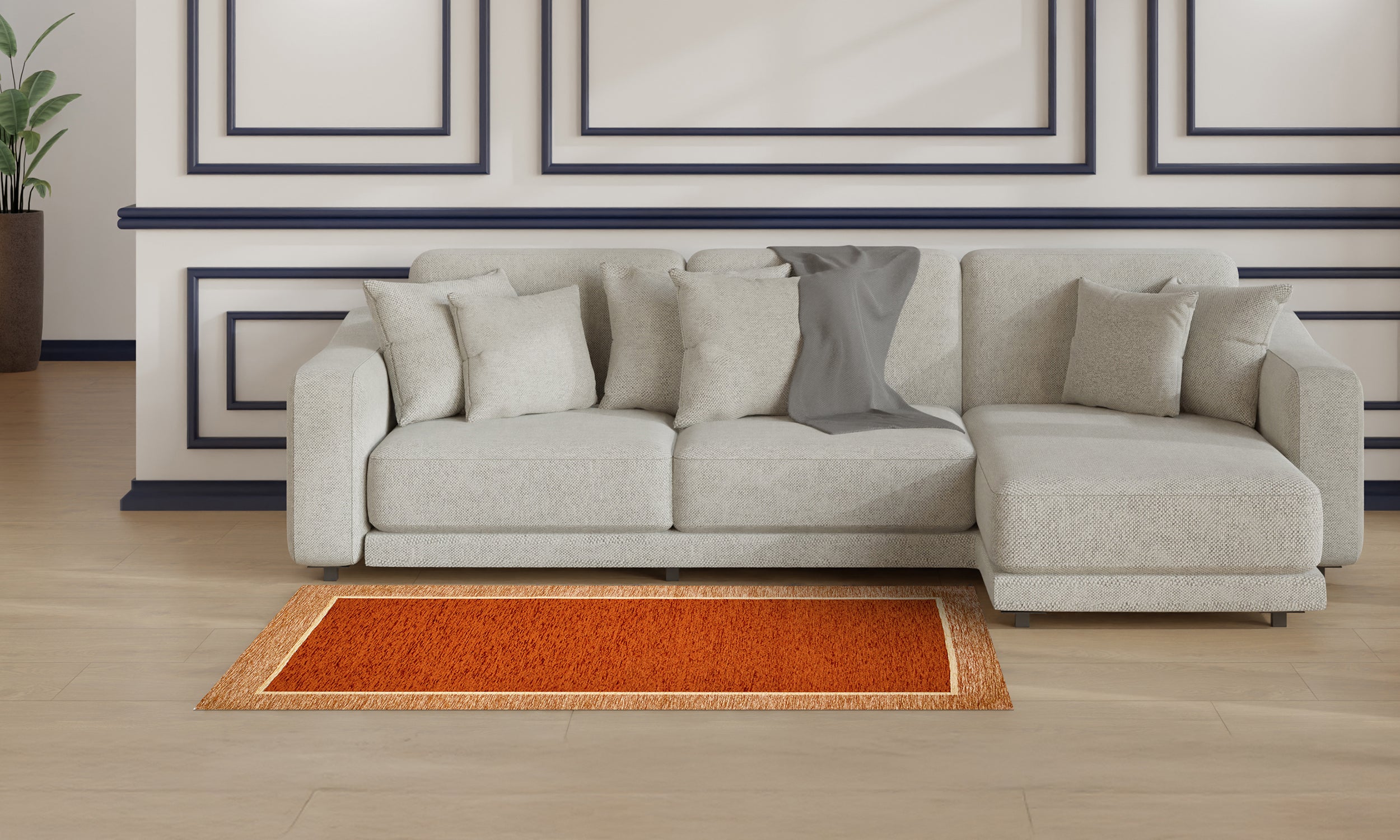 Modern ruggine rug on a stylish living room floor, complementing a light gray sofa and elegant decor.