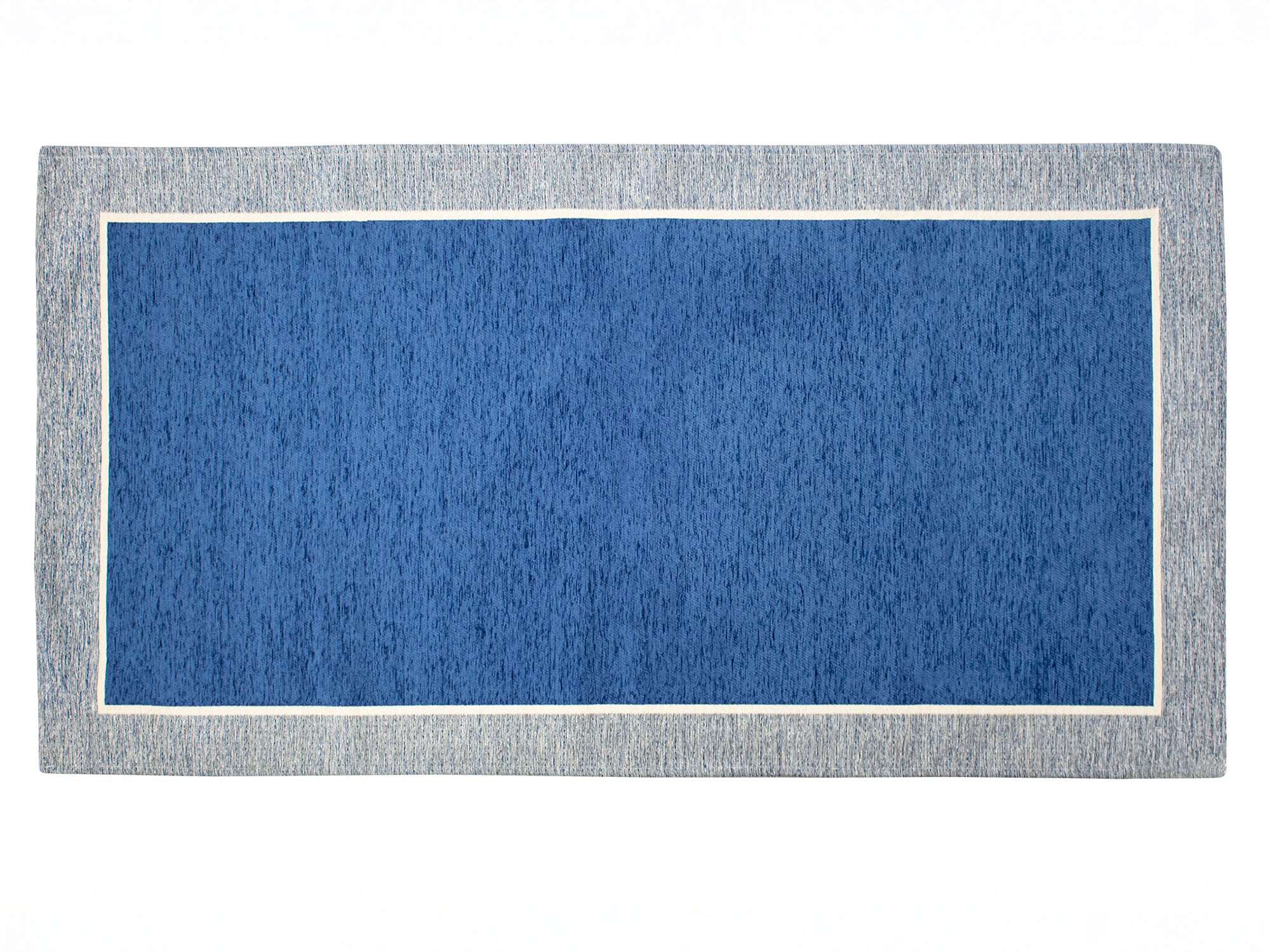 Tappeto blu mare 115x175 cm con bordo chiaro, antiscivolo e effetto scolpito, ideale per ogni stanza.
