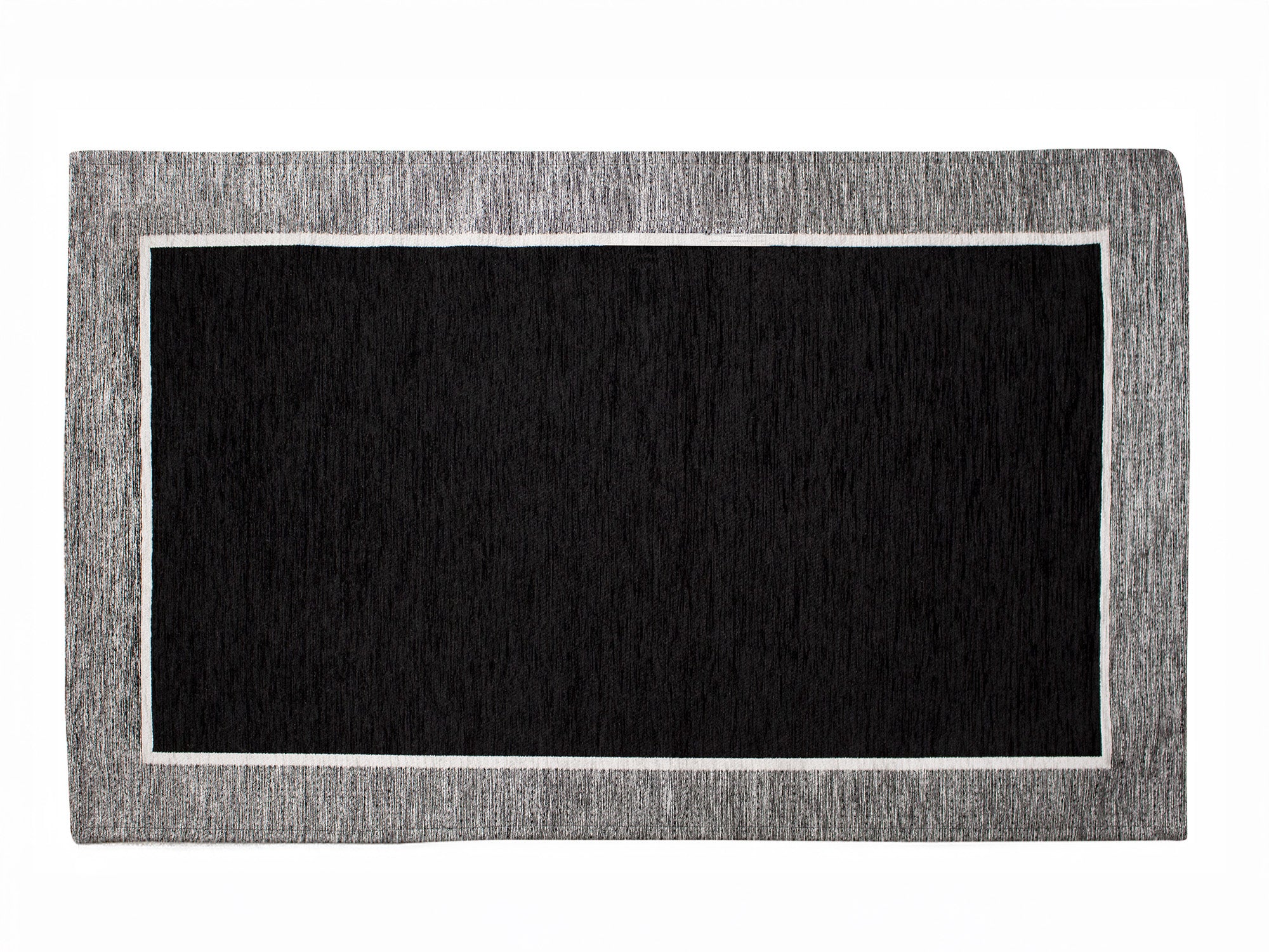 Tappeto arredamento nero scuro con bordo chiaro, dimensioni 115x175 cm, effetto scolpito e antiscivolo.